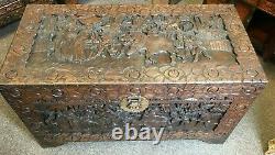 A Large Antique Carved Camphor Chinese Chest On Bracket Feet 105 x 52 x 58 cms