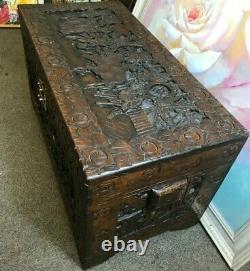 A Large Antique Carved Camphor Chinese Chest On Bracket Feet 105 x 52 x 58 cms