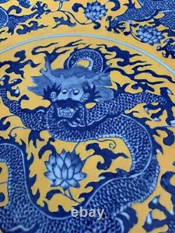 A Large Chinese antique porcelain yellow plate blue dragon Qianlong mark