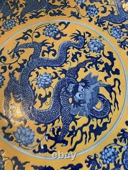 A Large Chinese antique porcelain yellow plate blue dragon Qianlong mark