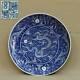 A Large Qing Blue And White Enamelled Dragon Dish, Chu Xiu Gong Zhi Seal Mark