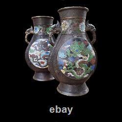 A good looking large pair of Chinese bronze vases. Champlevé or cloisonné