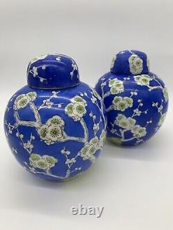 A large pair of Antique Chinese blue ground blossom ginger jars