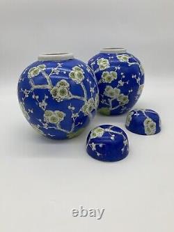 A large pair of Antique Chinese blue ground blossom ginger jars