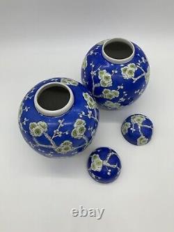 A large pair of Antique Chinese blue ground blossom ginger jars