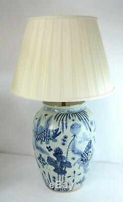 Exceptional Large pair of Chinese ceramic vase lamps with gild wood bases