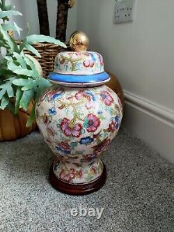 Large Antique Ginger Jar floral Design possibly Chinese with wooden base and lid