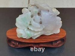 Large Chinese Jadeite carving with a stand