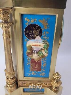Grand panneau de porcelaine chinoise ancienne et horloge de cheminée en métal doré