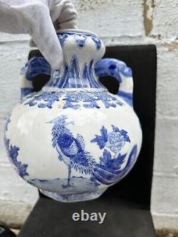 Poignée de tête de dragon chinois antique de grande taille, mesurant 28 cm de hauteur.
