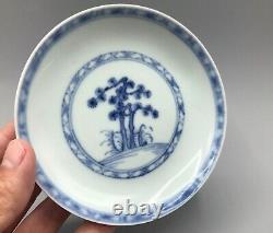 Translate this title in French: Naufrage de Nankin - Grande assiette à soucoupe en porcelaine 'Blue Pine'